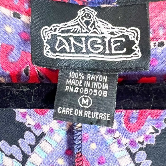 Angie Boho romper size medium
Crossover low neckline
Drawstring/elastic waist - Picture 2 of 4